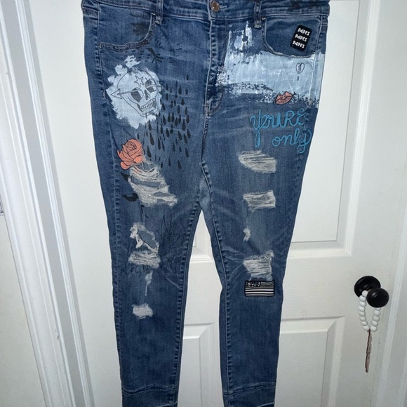 American Eagle Outfitters Denim - American Eagle Distressed Blue Jeans with Graphic Details